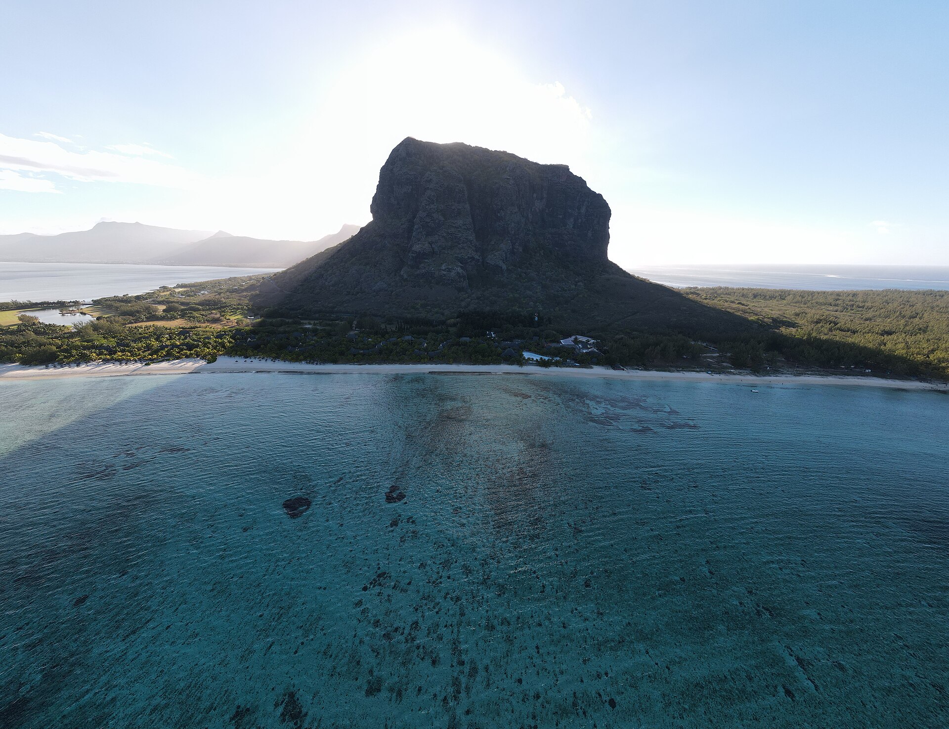 Le Morne Brabant rising above the lagoon in morning light