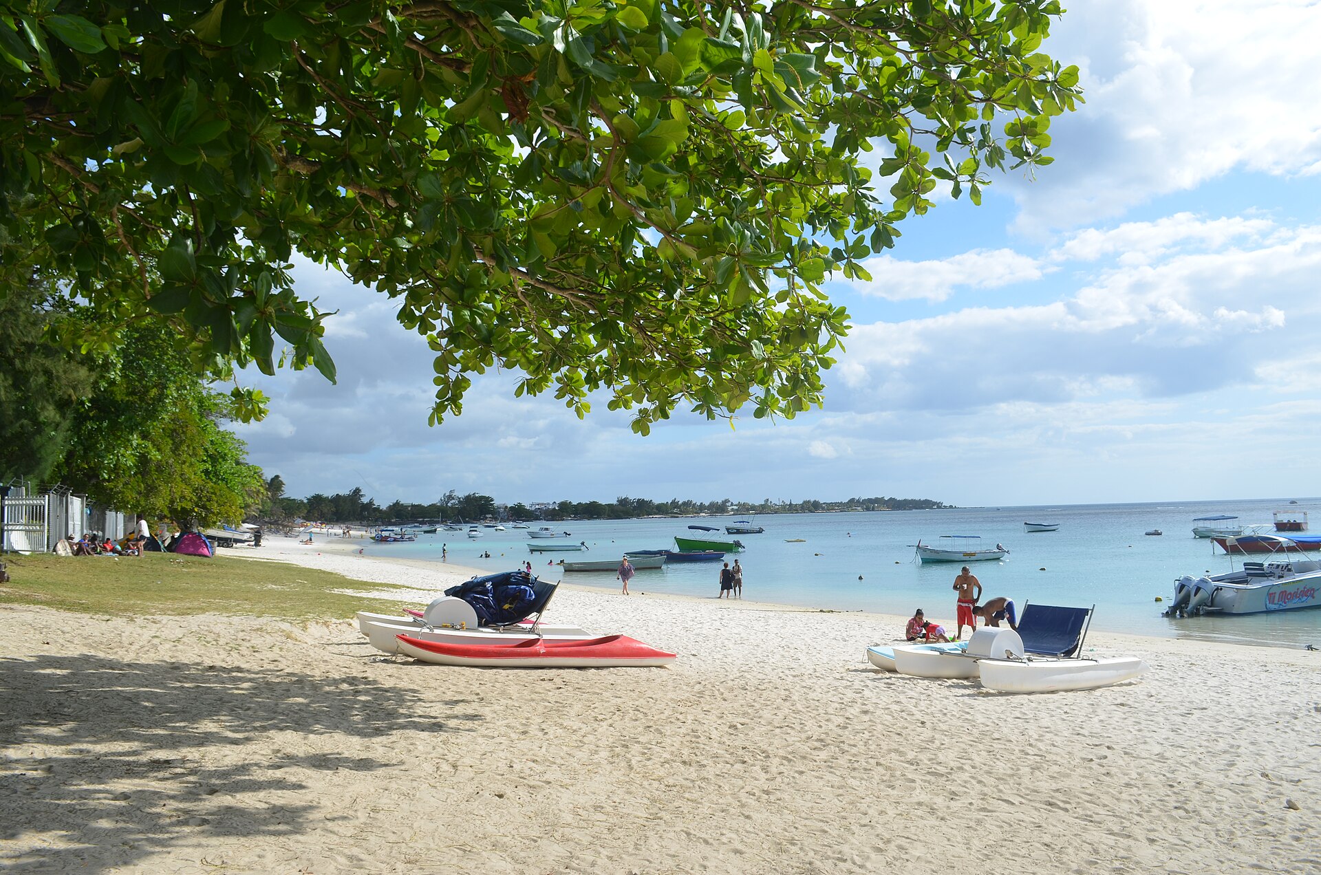 Boats moored off the beach at Trou aux Biches