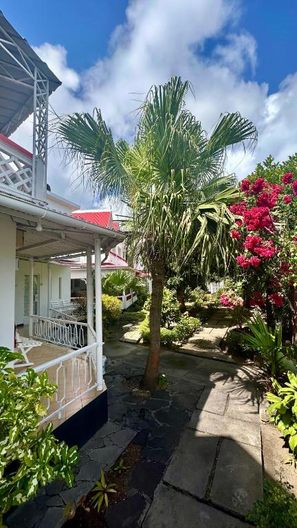 Garden and balconies at Pension Ciel d'Eté in Port Mathurin, Rodrigues